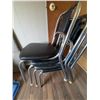 Image 1 : Four Black Vinyl and Chrome Stackable Chairs