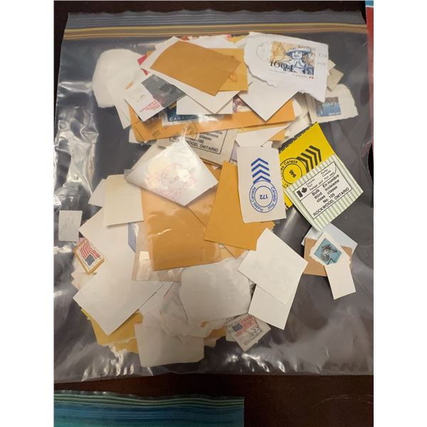 Postage Stamps on Paper in Plastic Bag