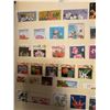 Image 9 : Large World Stamp Collection Album with Canada, Cuba, Poland, Animals, Flags, and More