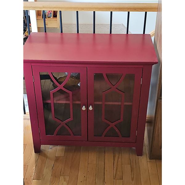Red Wooden Cabinet With Glass Pane Double Doors