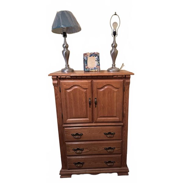 Oak Cabinet With Drawer Storage, Lamps, Clock, and Photo Frame