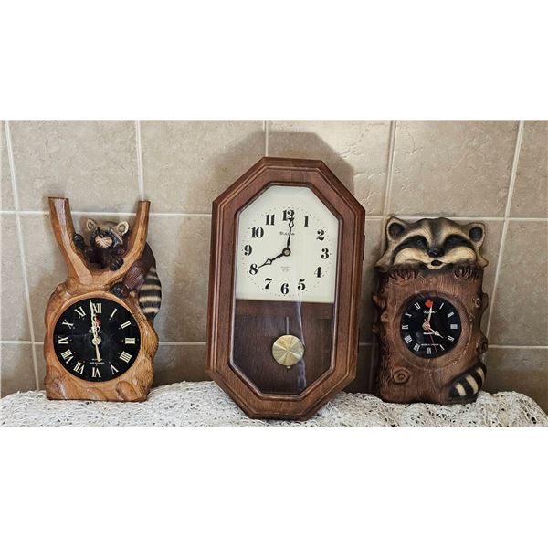 3 Clocks: Bulova Wall Clock and 2 Raccoon Motif Quartz Clocks