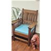Image 1 : Wooden Armchair With Blue Cushion and Ceramic Dog Statue