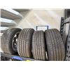 Image 1 : L1 - 4pc OEM Tesla wheels w/ Continental Pro-Contact 235/45R19 Tires