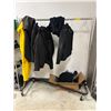 Image 1 : L2 - Clothing Rack with Assorted Workshop Clothes - Tesla/ Milwaukee Jackets etc.