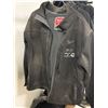 Image 6 : L2 - Clothing Rack with Assorted Workshop Clothes - Tesla/ Milwaukee Jackets etc.