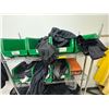 Image 2 : L2 - Uline Wire Shelving Rack with Assorted Workshop Clothes - Tesla branded and others