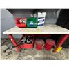 Image 1 : L2 - Contents of workbench including residue remover, suspension components, metal cans, etc.
