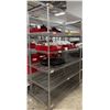 Image 1 : L2 - Steel wire rack & contents including phone dock, panels, Cybertruck wheel covers, etc.
