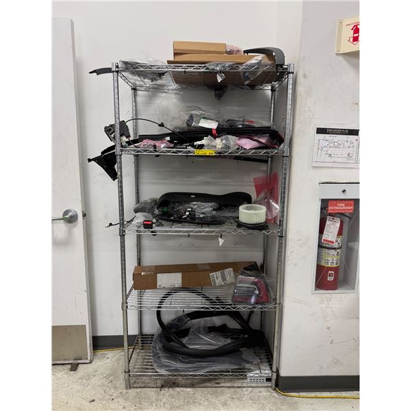 L2 - Rack w/ misc. OEM New Tesla parts including tail lights, seals, wood trim assembly, etc.