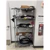Image 1 : L2 - Rack w/ misc. OEM New Tesla parts including tail lights, seals, wood trim assembly, etc.