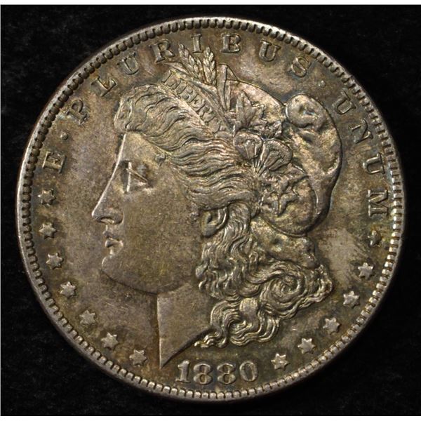 1880-O MORGAN DOLLAR BU TONED