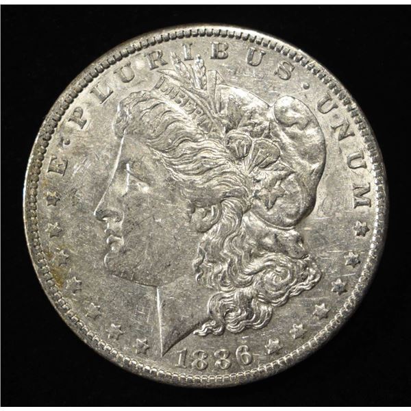 1886-O MORGAN DOLLAR AU