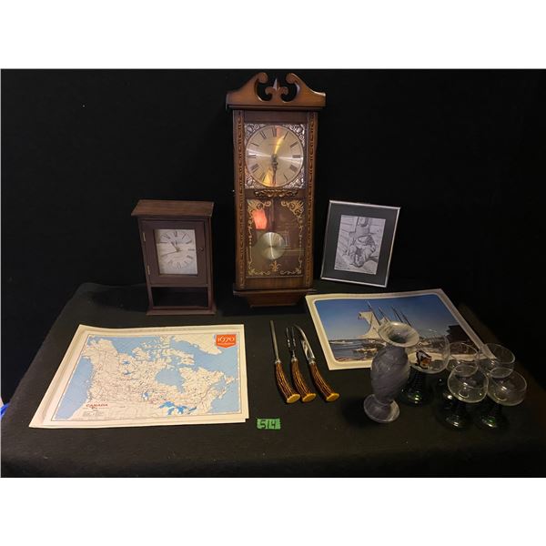 Home items including wall clock, mantel clock, wine glasses, carving knife set and more