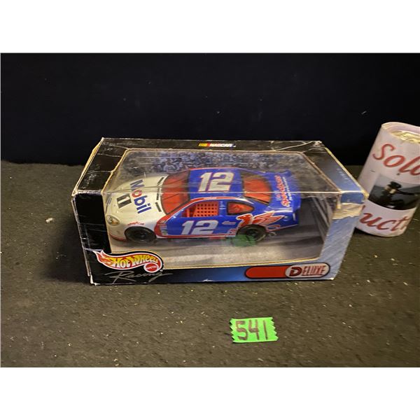 1:24 Scale diecast racing car by Hot Wheels