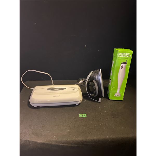 Iron, vacuum sealer and hand blender