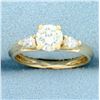 Image 1 : Round and Pear Diamond Engagement Ring in 14k Yellow Gold