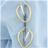 Image 1 : Abstract Heart Hoop Earrings in 14k White and Yellow Gold