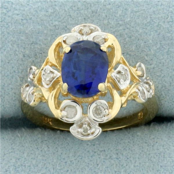 Sapphire and Diamond Scroll Design Ring in 14k Yellow Gold