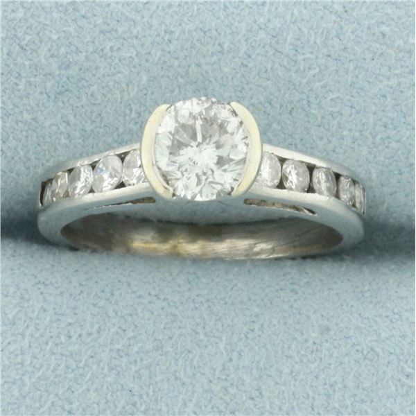 Unique Half Bezel Diamond Engagement Ring in Platinum