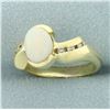 Image 2 : Opal and Diamond Ring in 18k Yellow Gold