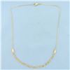 Image 1 : 16 Inch Italian Braided Serpentine Link Necklace in 18k Yellow Gold