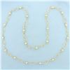 Image 1 : Extra Long Designer Link Ball Bead Necklace in 14k Yellow Gold