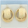 Image 2 : Diamond Cut Knot Design Earrings in 14k Yellow Gold