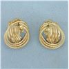 Image 3 : Diamond Cut Knot Design Earrings in 14k Yellow Gold
