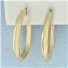 Image 1 : Diamond Cut Matte Finish Hoop Earrings in 14k Yellow Gold