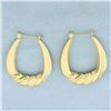 Image 1 : Large Oval Twisting Design Hoop Earrings in 14k Yellow Gold