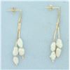 Image 1 : Baroque Pearl Dangle Earrings in 14k Yellow Gold