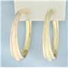 Image 1 : Large Hoop Earrings in 14k Yellow Gold