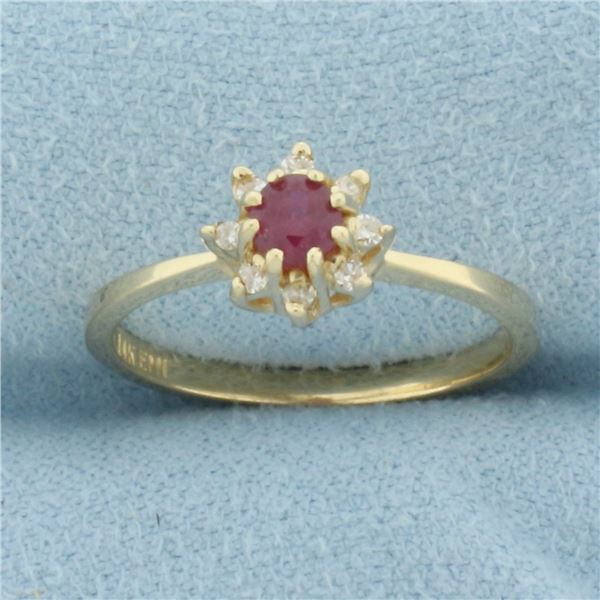 Ruby and Diamond Halo Flower Ring in 14k Yellow Gold