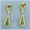 Image 2 : Emerald Dangle Earrings in 18k Yellow Gold