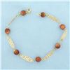 Image 1 : Orange Goldstone Bracelet in 14k Yellow Gold