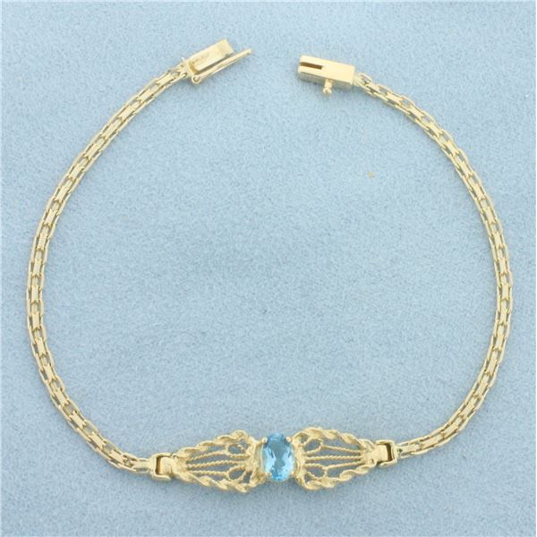 Swiss Blue Topaz Bracelet in 14k Yellow Gold