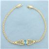 Image 1 : Swiss Blue Topaz Bracelet in 14k Yellow Gold