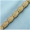 Image 2 : Champagne Diamond Bracelet in 10k Yellow Gold