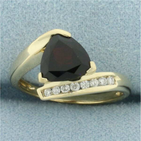 Garnet and Diamond Bypass Ring in 10k Yellow Gold