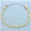 Image 1 : Diamond Cut Heart Link Bracelet in 10k Yellow Gold