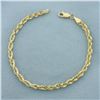 Image 1 : Rope Bracelet in 14k Yellow Gold