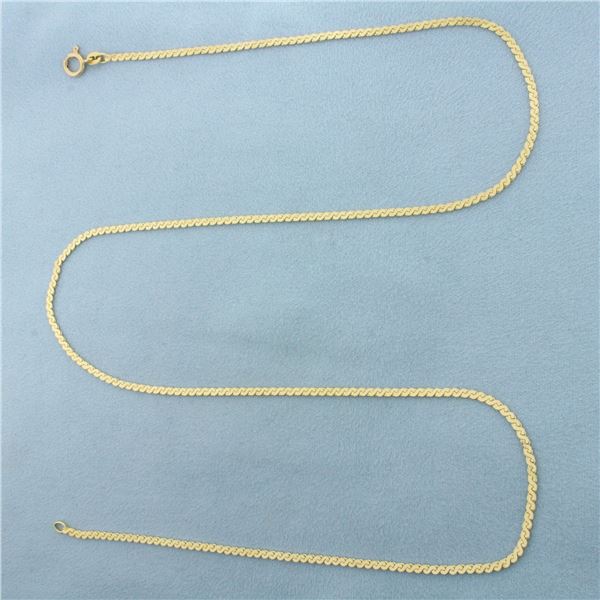 24 Inch Serpentine S-Link Chain Necklace in 14k Yellow Gold