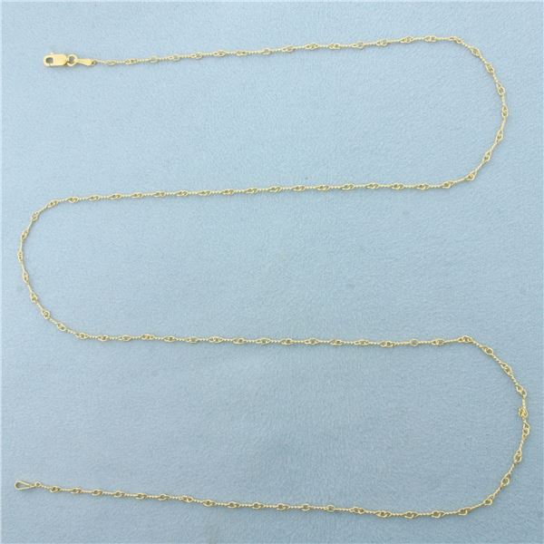 24 Inch Italian Twisting Link Chain Necklace in 14k Yellow Gold