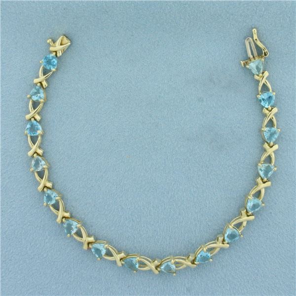Sky Blue Topaz X Link Bracelet in 10k Yellow Gold