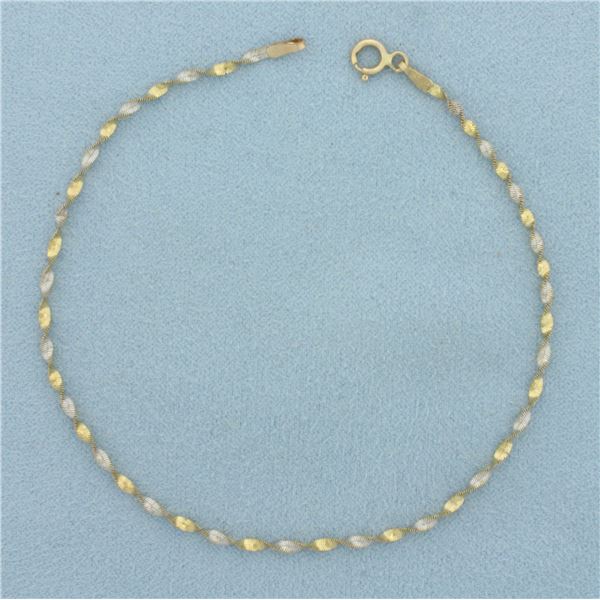 Two Tone Twisting Herringbone Bracelet in 14k Yellow and White Gold