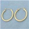 Image 1 : Tube Hoop Earrings in 14k Yellow Gold