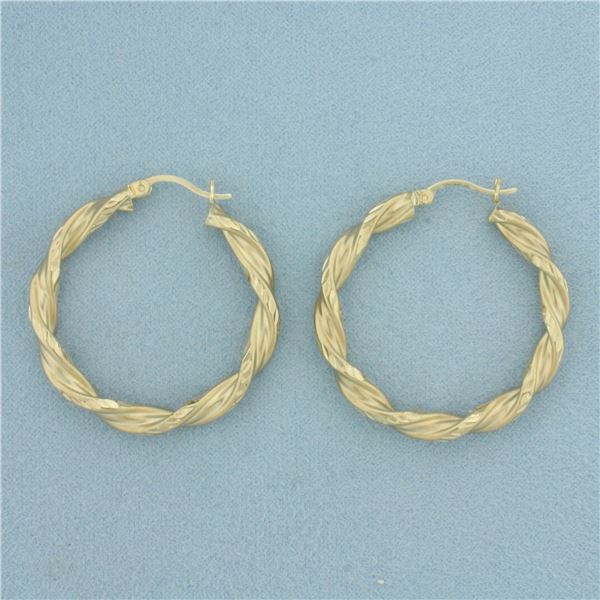 Twisting Desing Hoop Earrings in 10k Yellow Gold