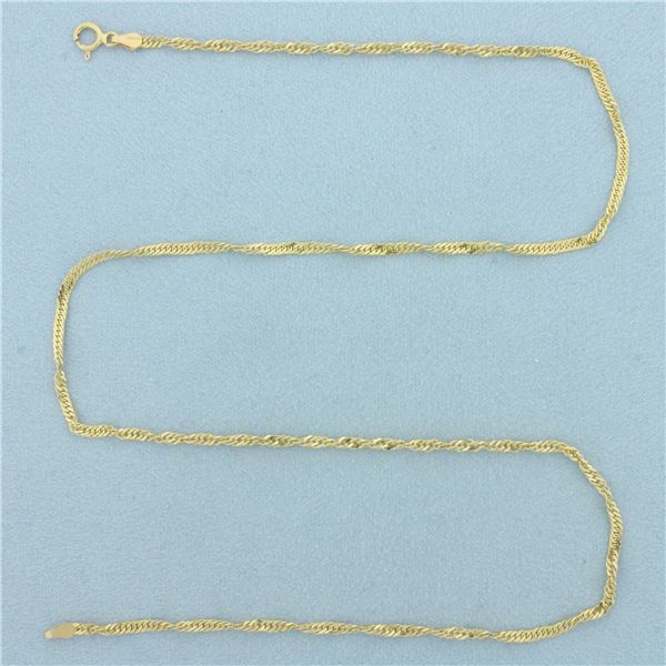 18 Inch Twisting Curb Link Chain Necklace  in 14k Yellow Gold