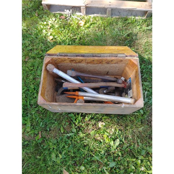 Vintage woodworking tools in wooden chest with handles